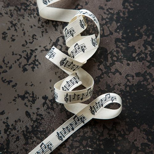 Nastro musica in cotone colore panna con note nere